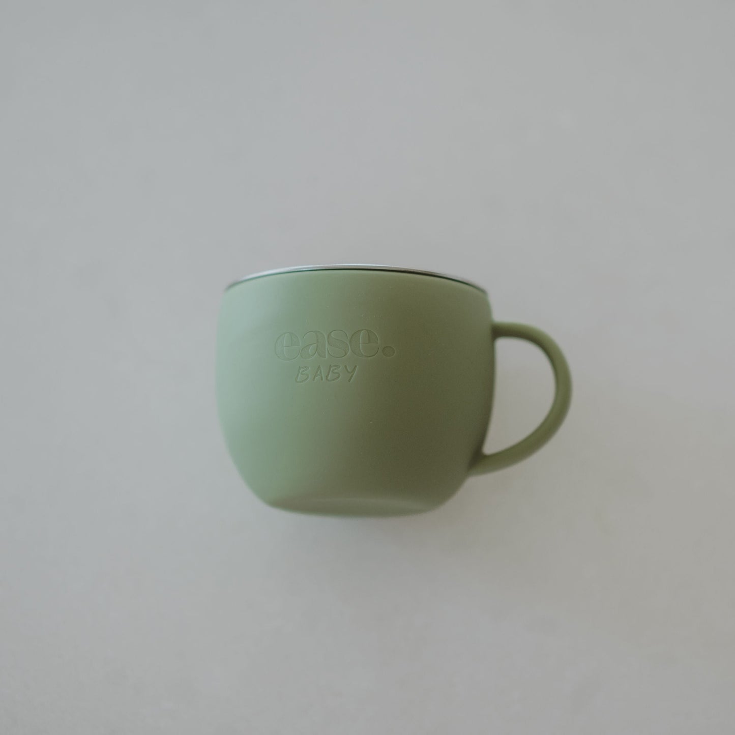 Green mug on a white background